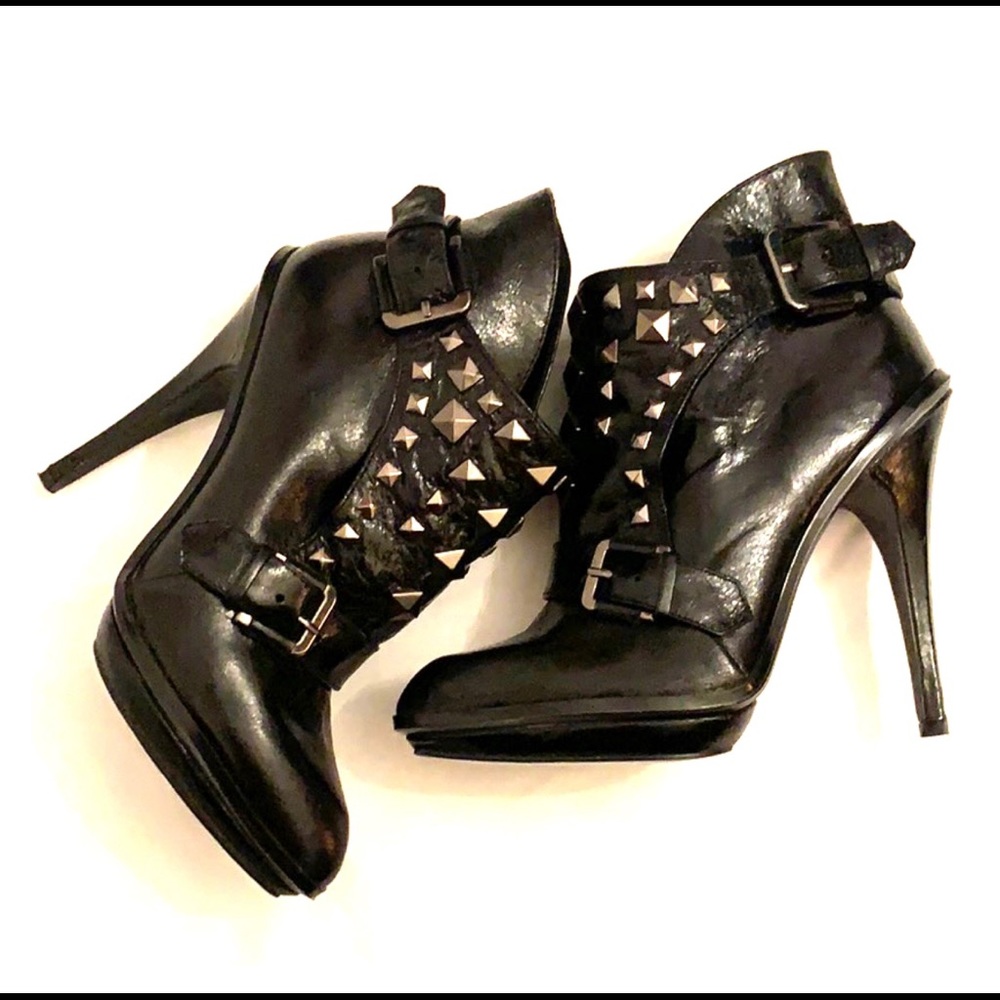 Glossy black leather booties
